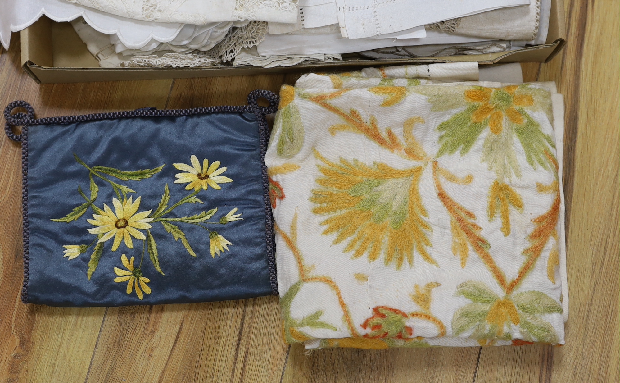A small group of embroidered, drawn thread and cut-worked table linens